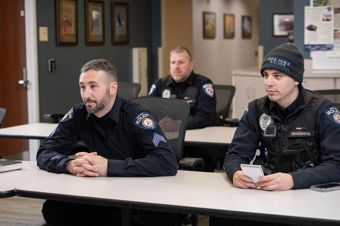Ashland police officers in meeting room